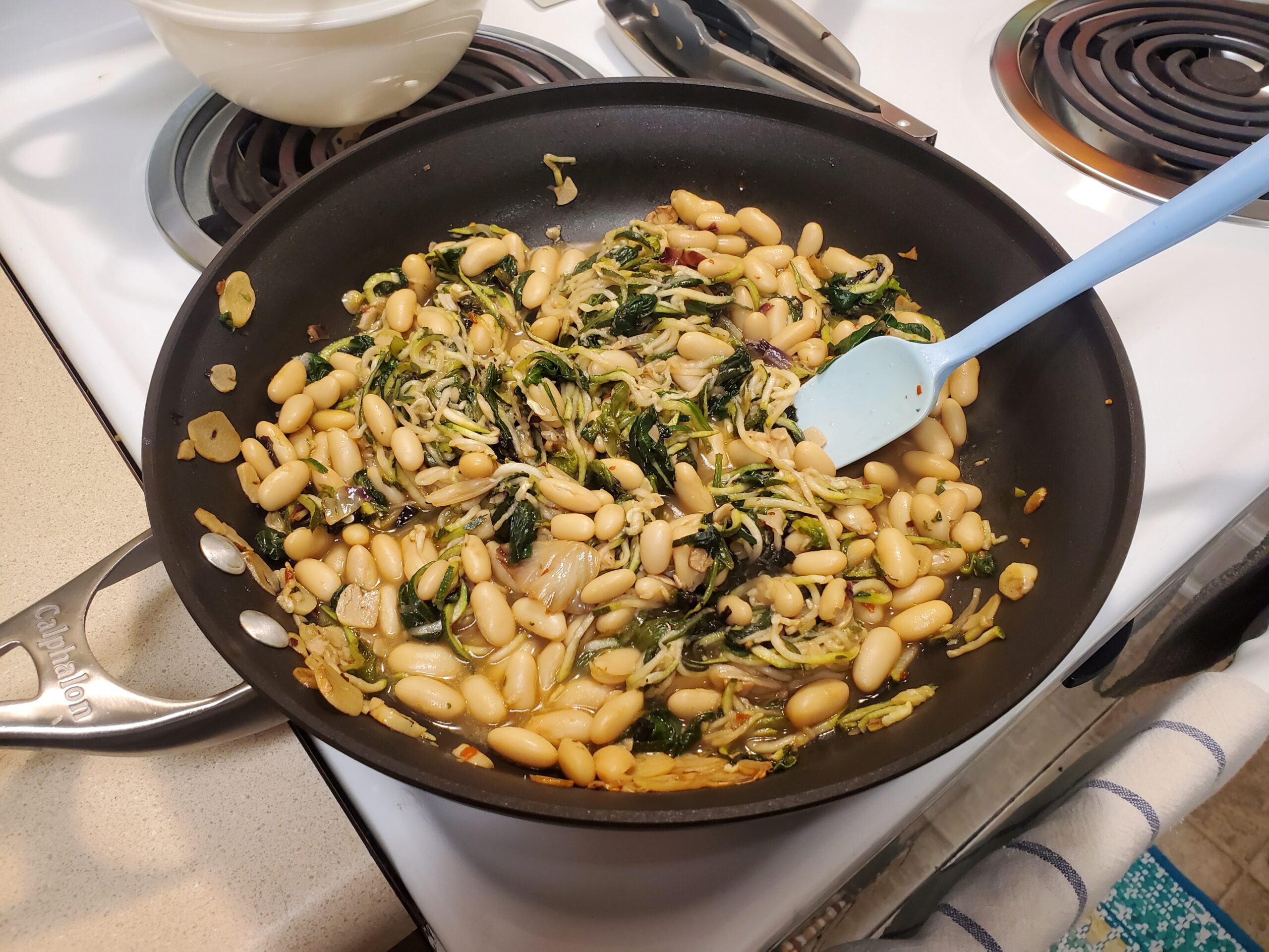 white beans and escarole over zucchini spirals